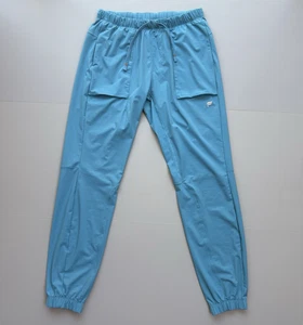 Fabletics The One Jogger Hombre Medio Azul Teal Rendimiento Elástico Ligero - Imagen 1 de 13