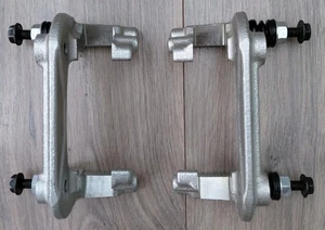 Sierra Cosworth 4wd/4x4 Vented rear brake caliper carrier brackets & slide pins - Picture 1 of 2