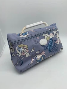 Bolso clutch Longchamp de lona con estampado floral en muy buena condición tejido cuero blanco lindo bonito - Imagen 1 de 13