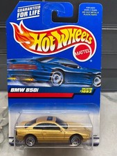 HOT WHEELS 1999 BMW 850I GOLD COUPE W/1990 DATE ON BOTTOM NEW IN PACKAGE