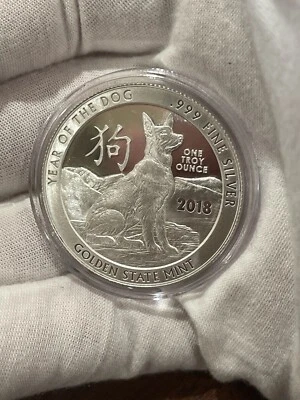 GSM Año Nuevo Lunar Chino - 1 oz. Ronda de plata Año del Perro 2018 en cápsula Foto 1 de 2