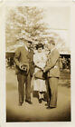 Two Men,  Women, One Man Holding  Photo Camera - Original Vintage Snapshot Photo