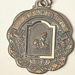 NORTHERN INTERCOLLEGIATE CONFERENCE FREE STYLE SWIMMING MEDAL 1966 - Picture 1 of 4