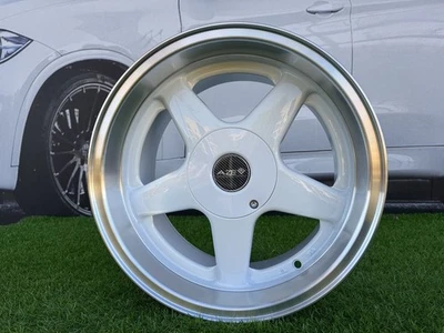 4X15 Zoll 4X100/5X114,3 Azev Typ A Style weiße Felgen passend für: E30, Honda, Mazda - Bild 1 von 4