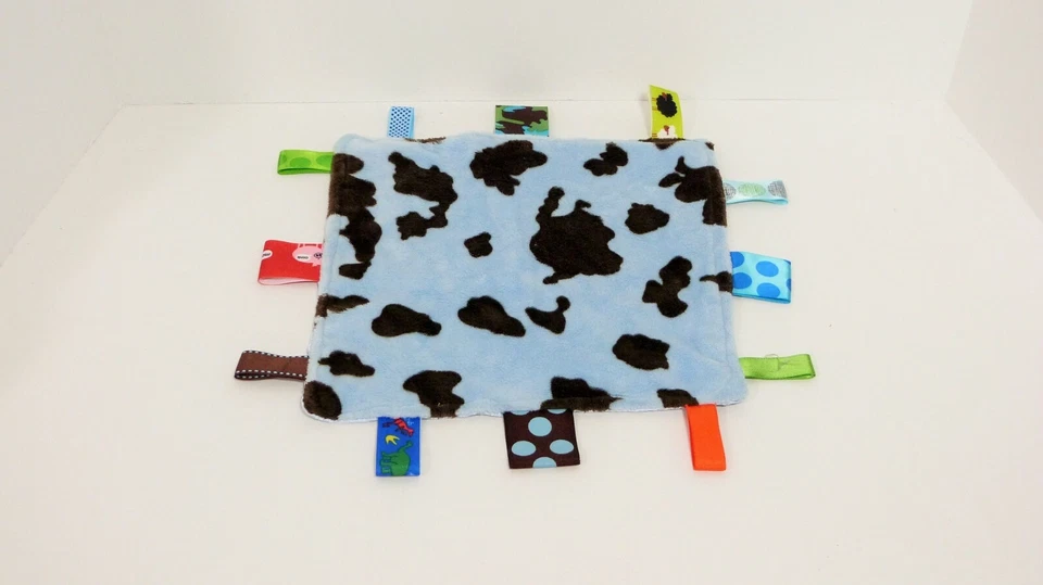 Hecho a mano Lovey con etiquetas azul con diseño de cuero de vaca marrón animal de granja dinosaurio camuflaje usado en excelente estado Foto 1 de 2