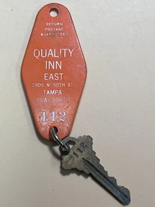 Llavero y llave tampa de habitación de hotel Quality Inn Florida #112 - Imagen 1 de 2