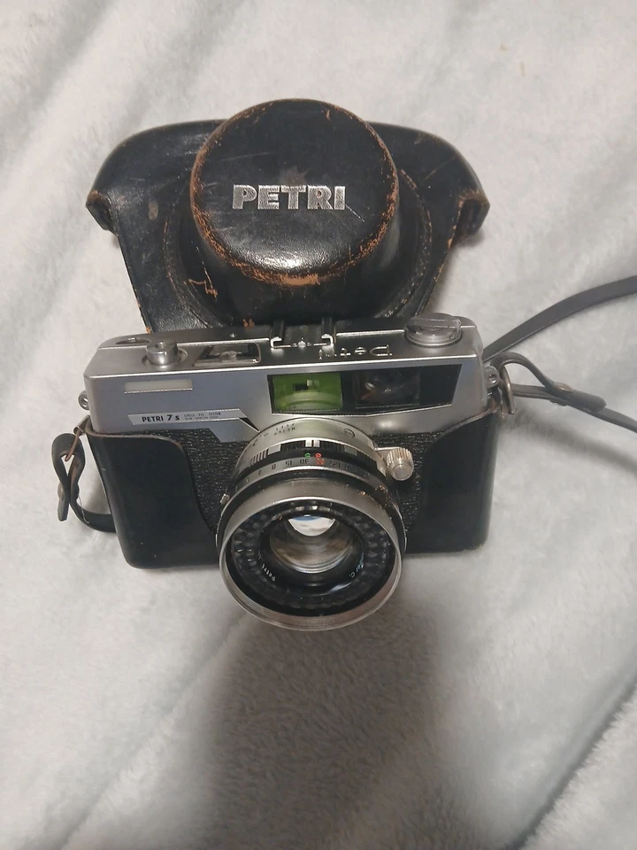 Sistema de ojos circulares Petri 7 S 35 mm cámara fotográfica telémetro con estuche  Foto 1 de 4