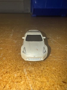 Maisto 2009 Nissan 370Z bianco scala 1/24 sfuso - Foto 1 di 5