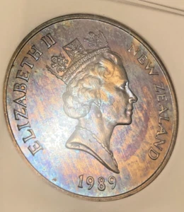 New Zealand Dollar, 1989, XIV Commonwealth Games, Swimmer, RAINBOW TONED NGC M63 - Picture 1 of 9