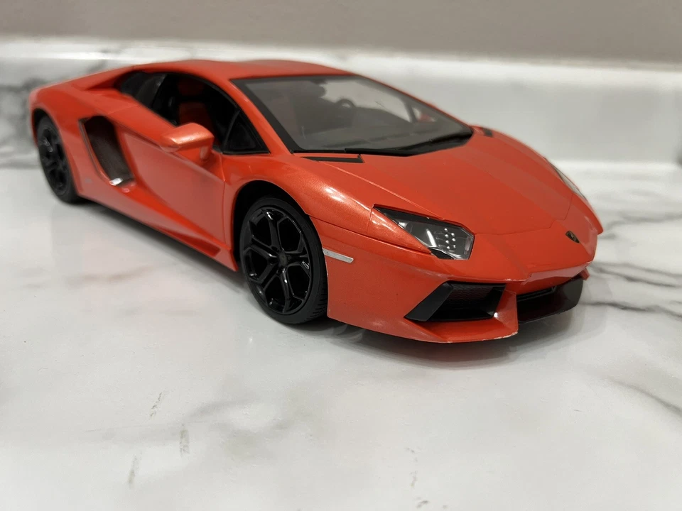 1:14 RC Lamborghini Aventador LP700 Coupe Orange by RASTAR No Remote - Image 1 of 4