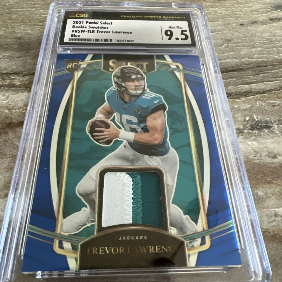 2021 Select Rookie Swatches patch Trevor Lawrence  Blue /35 Card Number RSW-TLR - Image 1 of 2