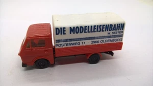 Herpa Volkswagen VW LT 28 Pritsche/Plane orangerot weiß Die Modelleisenbahn (85) - Bild 1 von 3