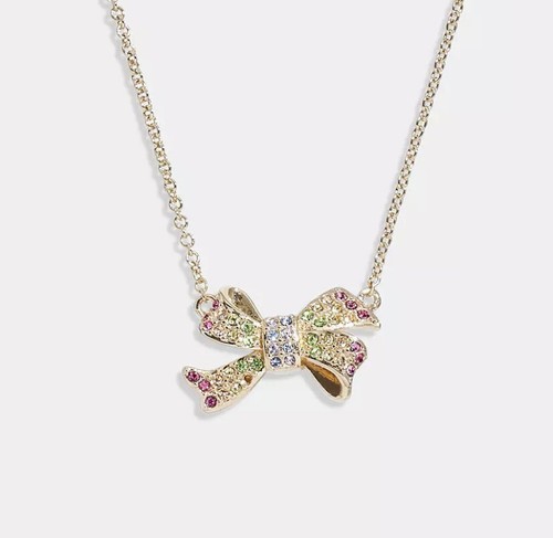 Collana Ciondolo Fiocco Coach Pavimentazione Nuova Senza Etichette Prezzo al dettaglio $118