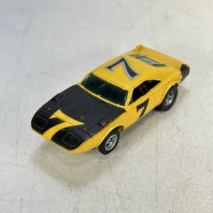 Caricabatteria vintage Aurora AFX Dodge Daytona Super Bird giallo/nero #7 senza ala - Foto 1 di 9