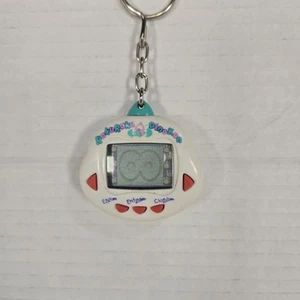 DE COLECCIÓN DINKIE DINO *RAKURAKU DINOKUN* ¡MASCOTA VIRTUAL BLANCA! Probado y funcionando - Imagen 1 de 7