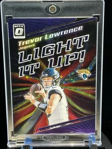 Donruss Optic Trevor Lawrence Light It Up Purple Stars Prizm/25 Jaguars 2023 - Imagen 1 de 14