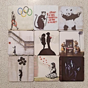 9 Alfombrilla/montaña rusa Banksy buen estado - Imagen 1 de 11