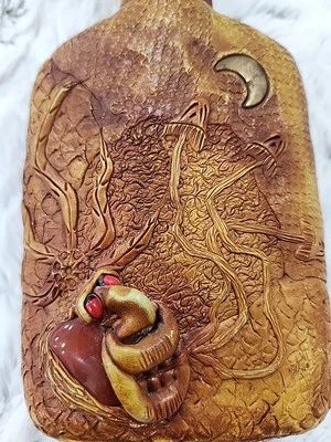 Botella de vidrio cara, hongo luna arcilla polimérica, piel y piedras pulidas América del Sur Foto 1 de 4