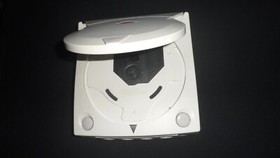 console dream cast, with cables of audio and video y controller.