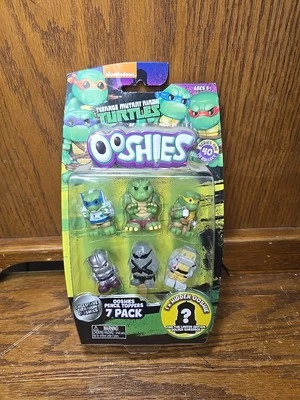TMNT Teenage Mutant Ninja Turtles OOSHIES Serie 1 Lápiz Toppers Paquete de 7 (juego 1) Foto 1 de 3
