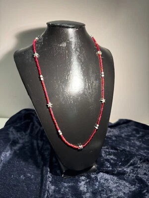 COLLANA DI PERLINE LUCITE ROSSE CON STELLINE ARGENTATE BIJOUX - Immagine 1 di 2