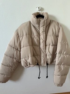 RISING Cropped Puffer Jacket In Beige - Picture 1 of 5