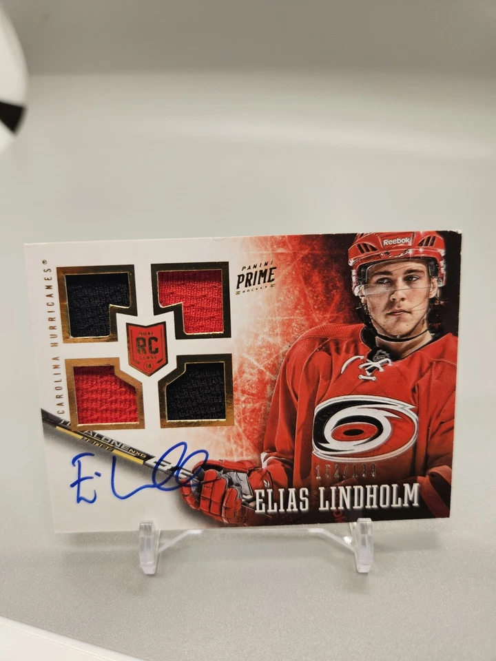 2013-14 Panini Prime Rookie Jersey Auto Elias Lindholm /199 - Image 1 of 3