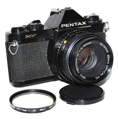 Pentax MV con lente de 50 mm f/2,0 + filtro de lente y tapa Foto 1 de 4