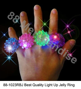 24 große leuchtende Jelly Ringe blinkende LED holprig Gummi Party Hochzeit Tanz Rave - Bild 1 von 3