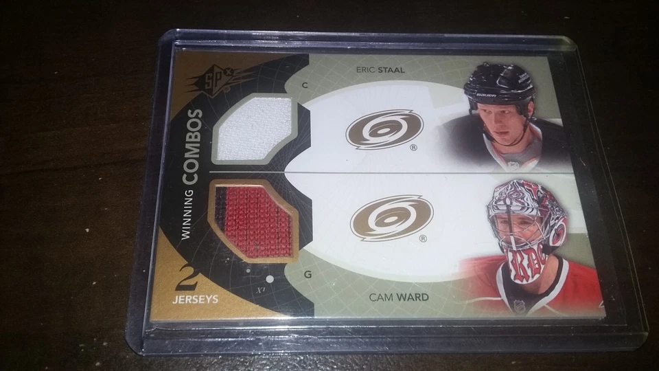 2010-11 SPX Winning Combos Dual Jersey ERIC STAAL & CAM WARD #WC-SW - Image 1 of 1