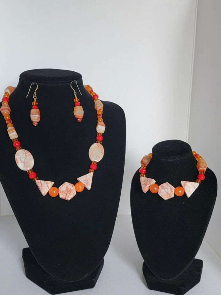 Precioso conjunto de joyas de cristal de Swarovski carniliano, mármol, topacio. Envío gratuito. Foto 1 de 4