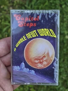 A Whole Newt World by Capitol Steps Cassette New Sealed in Package Parodies - Picture 1 of 6
