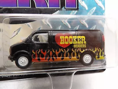 WHITE LIGHTNING 2000 GMC 2500 VAN         2000 JOHNNY LIGHTNING TRUE GRIT   1:64 - Image 1 of 4