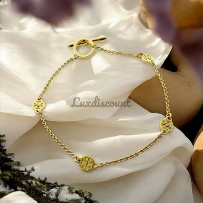 Tory Burch Gold Logo Toggle Station Bracelet in gold. Retail $118 - Image 1 of 3