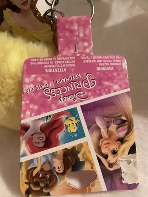 1 chaveiro Disney Beauty and the Beast Princess Belle fob amarelo peludo puff - Imagem 1 de 4