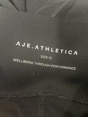 Aje Athletica Black tights 7/8 length Size 10 - GUC Activewear High Waisted - image 1 of 4