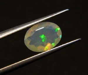 Natural Ethiopian Opal 0.90 Carat Faceted Oval Shape Gemstone 6.5x9mm Stone Size - Picture 1 of 4