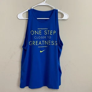Canotta Nike Dri-Fit donna L blu un passo più vicina alla grandezza senza maniche palestra - Foto 1 di 9