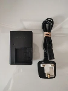 Cargador de batería para cámara digital Sony BC-CSD negro genuino probado funcionando - Imagen 1 de 2