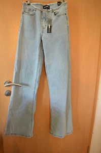 Big Flirt Cut Off Waistband Low Rise Flare Jeans Fashion Nova Medium Blue Wash - Bild 1 von 14
