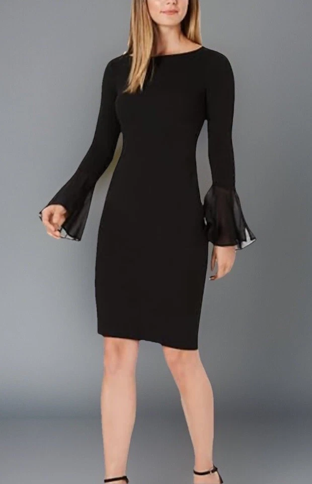 Ladies Size 6 Calvin Klein Black Dress With Exaggerated Cuff And Gold Back Zip - Image 1 of 4
