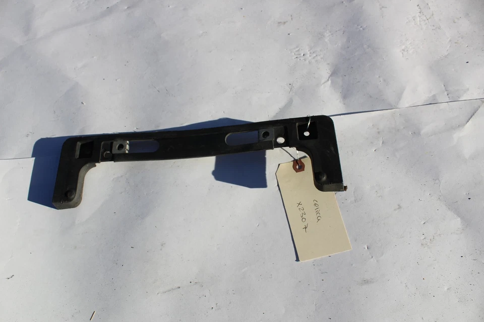 00-05 CELICA GT GTS FRONT BUMPER LICENSE PLATE BASE BRACKET X2307 - Image 1 of 4