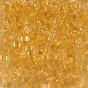 TL-132, TOPACIO Claro Transparente, 5g, Media Tila, 2 Agujeros, 5x2.3x1.9mm, (ht38) - Imagen 1 de 1