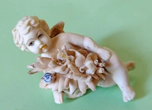 Putto Capodimonte in porcellana bianca opaca. Nessuna sbeccatura - Foto 1 di 6