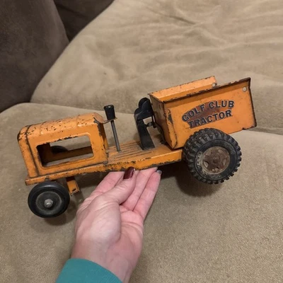 Carro tractor de palos de golf Tonka naranja años 50 acero prensado vintage Foto 1 de 4