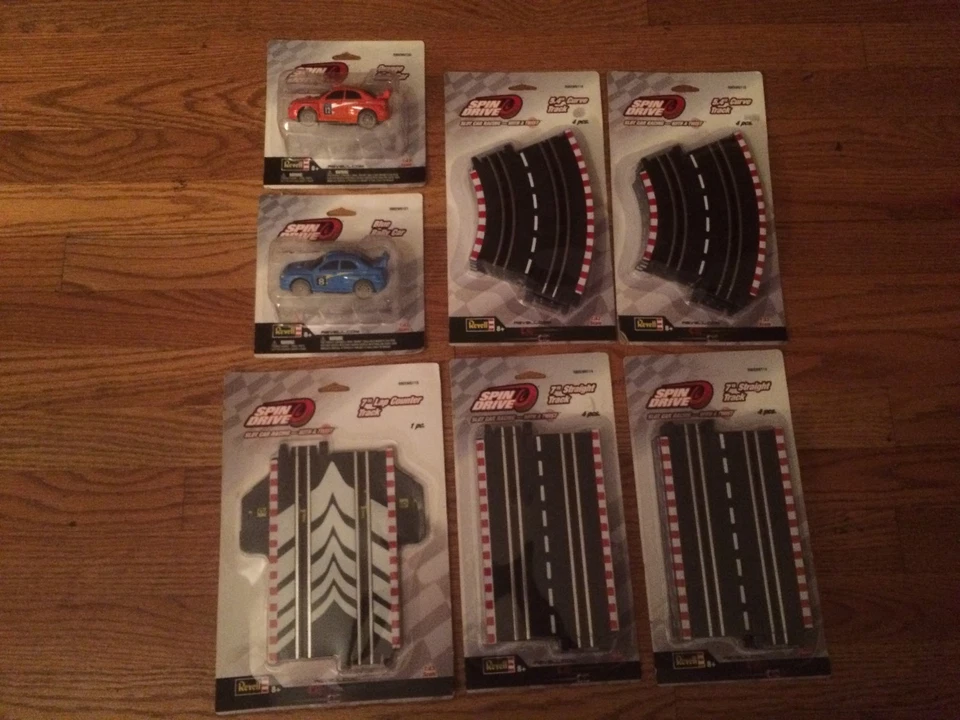 Revell Spin Drive Slot Car Racing 5 Asst. Paquetes de pistas y 2 coches ¡Nuevos en paquetes! Foto 1 de 4