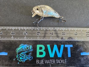 Baby 1-Minus wie Köder - gerillt: klar mit etwas Farbe **beschädigt** - Bild 1 von 7