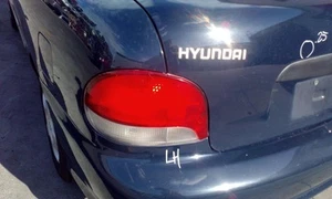 HYUNDAI EXCEL LEFT TAILLIGHT X3, HATCH, LATE, 02/97-09/00 97 98 99 00 - Picture 1 of 1
