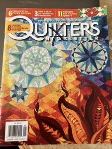 Revista Quilters Newsletter diciembre/enero 2011 piezas de papel edredones de invierno y más - Imagen 1 de 5