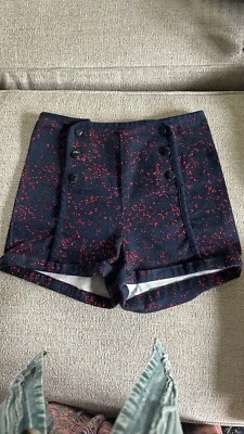 Pantalones cortos cooperativos de cintura alta con botones para mujer Foto 1 de 4